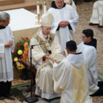 Br. Ephrem Martinez receives the Gospels.