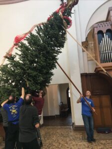 How many monks does it take to take down a Christmas tree? At least six!