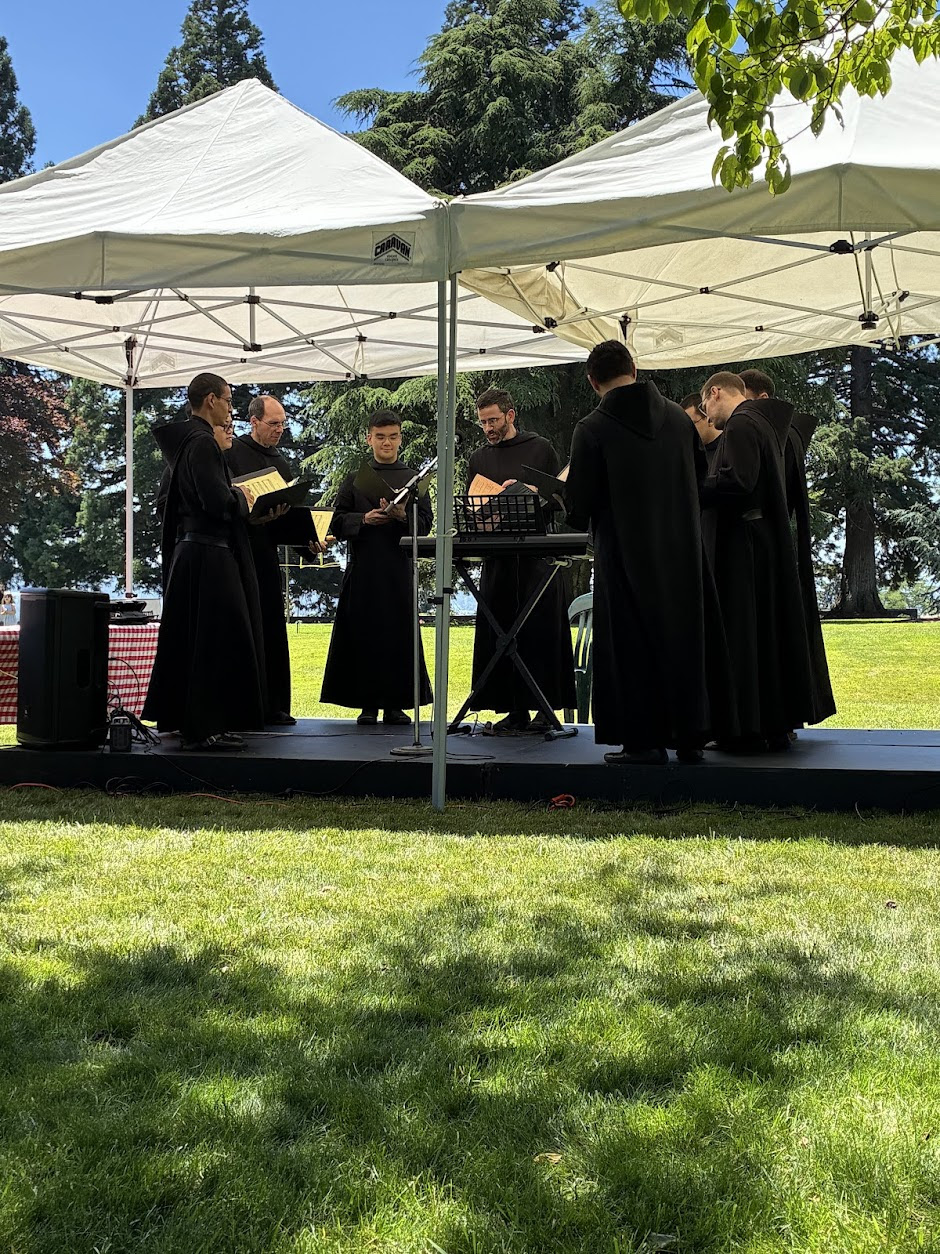 Monks playing music at Oblate Picnic