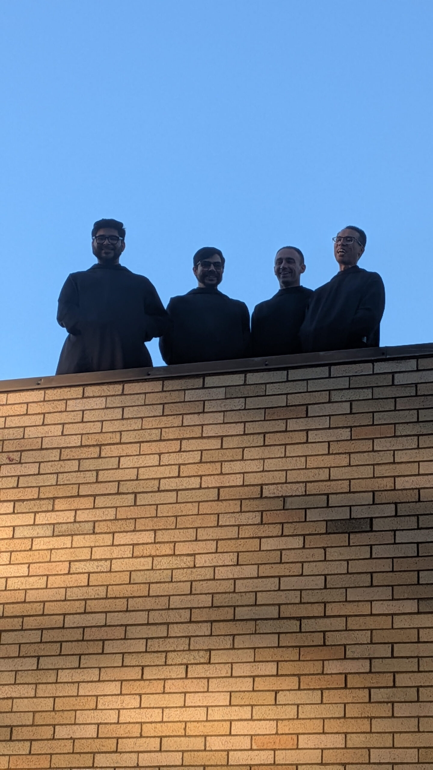 Monks on top of library