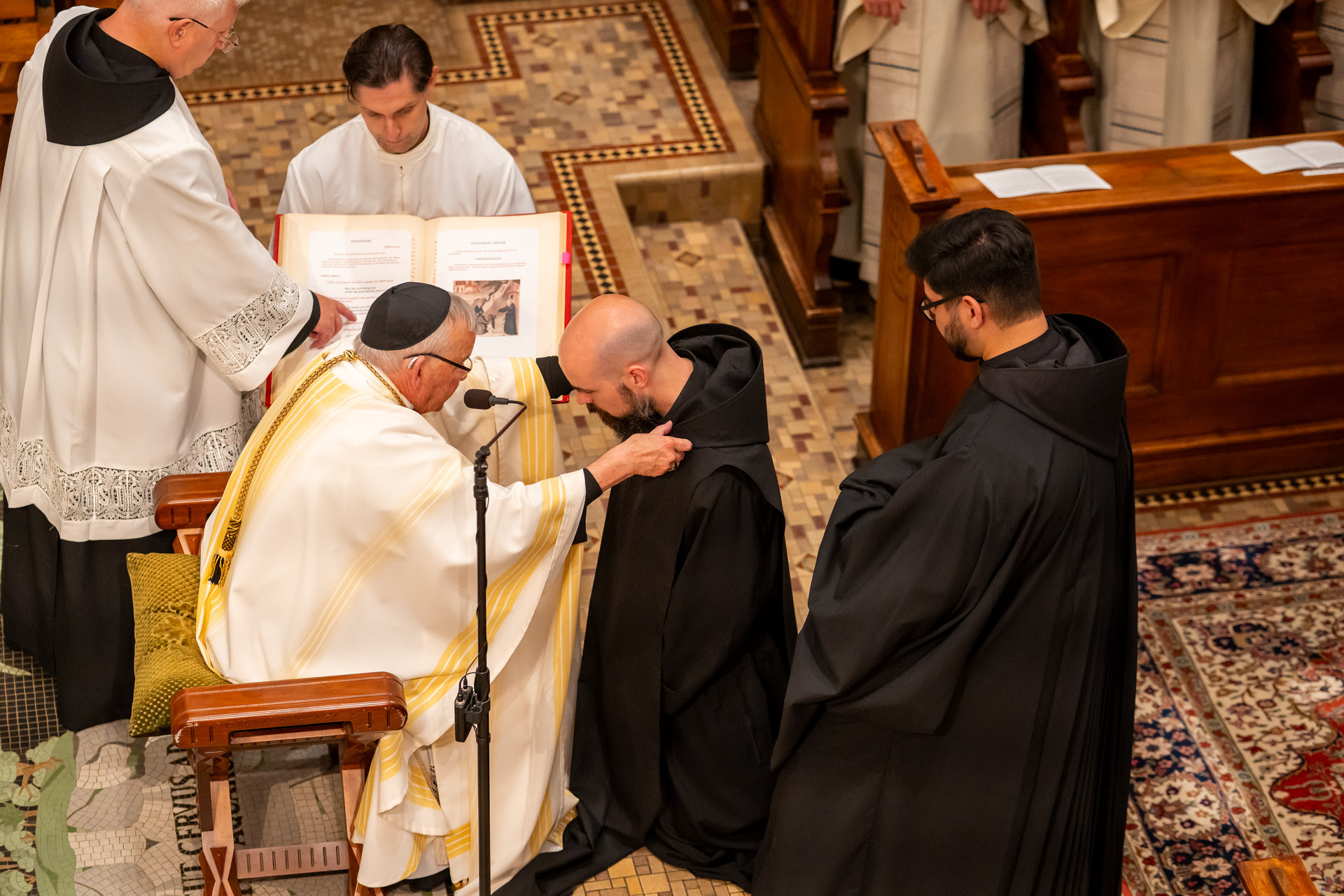 Br. Mark receiving his scapular.