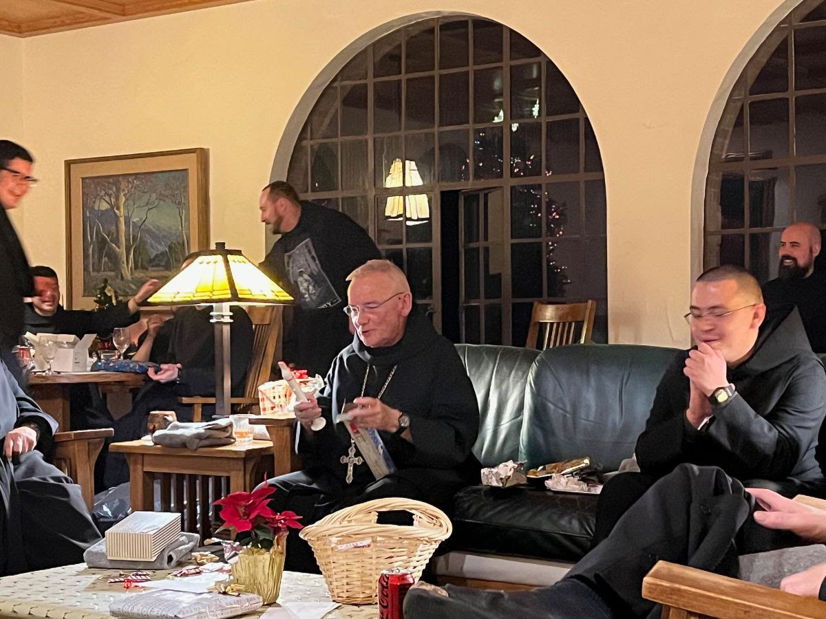 Abbot Jeremy receiving his Christmas gift